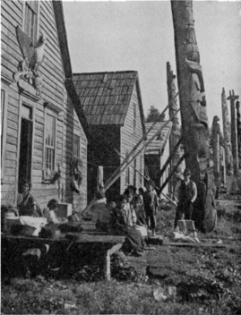 An Alaskan Village Showing Indian Totem Poles.