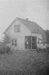 Beginning a home in the prairie—house and table "lands"
are built on cement foundation.