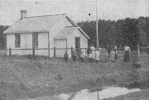 Typical school in rural district in Western Canada, which
will soon be replaced by consolidated school, picture of which appears
elsewhere.
