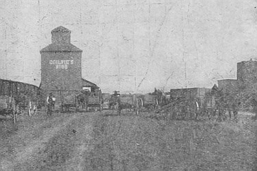Marketing the grain at one of the elevators that are
essential at every station in Western Canada.