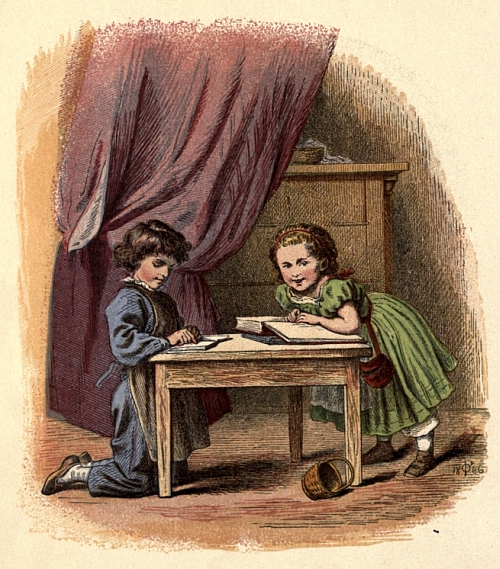 Children reading at the table