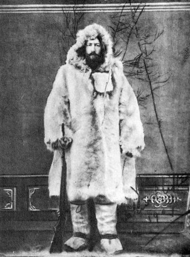 Talbot Clifton with full beard in seal coat and boots