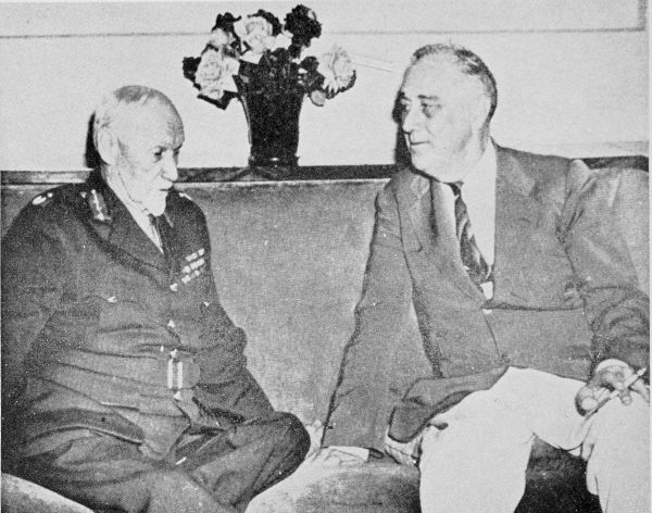 photo of Smuts and President Roosevelt sitting on a couch conferring