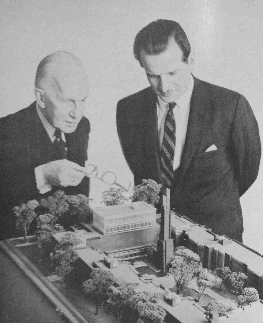 The President of the University of Toronto and the author with model of Massey College