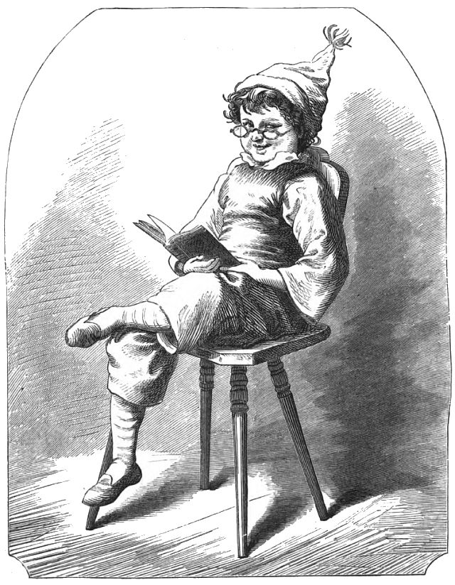 a boy wearing a pointed cap and glasses is sitting on a chair with a book in his hands