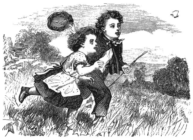 Two children are running through a field chasing a butterfly.
