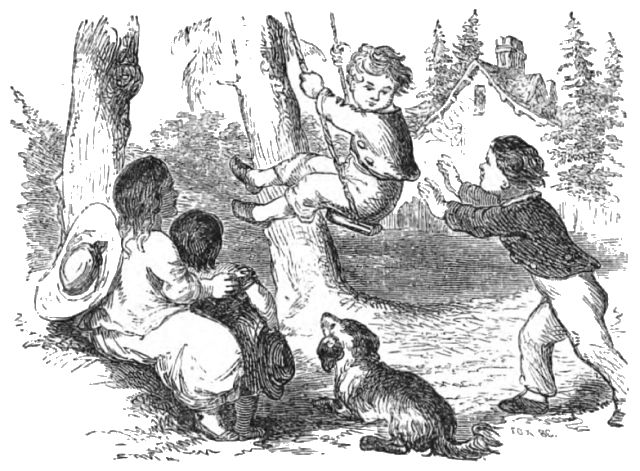 A boy is pushing another boy on a swing while two other children and a dog watch
