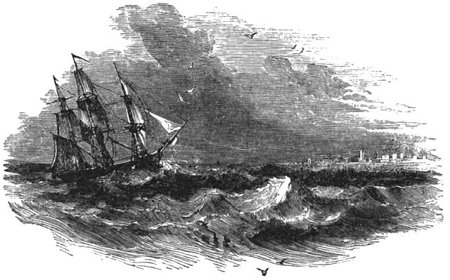 A sailing ship being tossed on high waves on the ocean