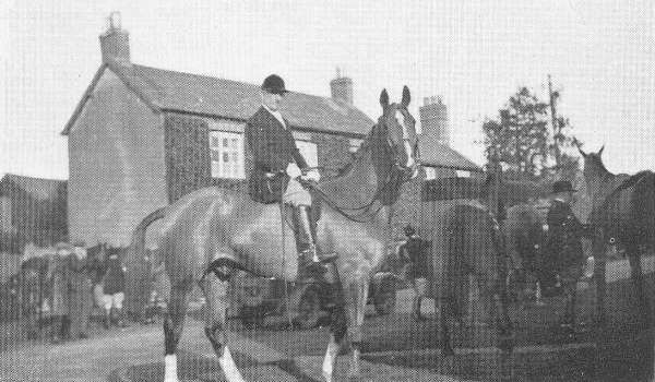 a hunter firmly seated on a horse