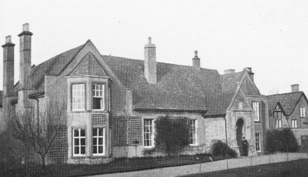 a two-story cottage with 6 chimneys