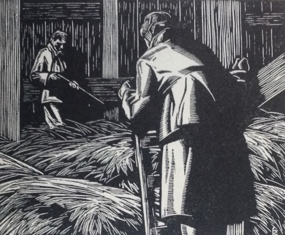 Two men in a barn