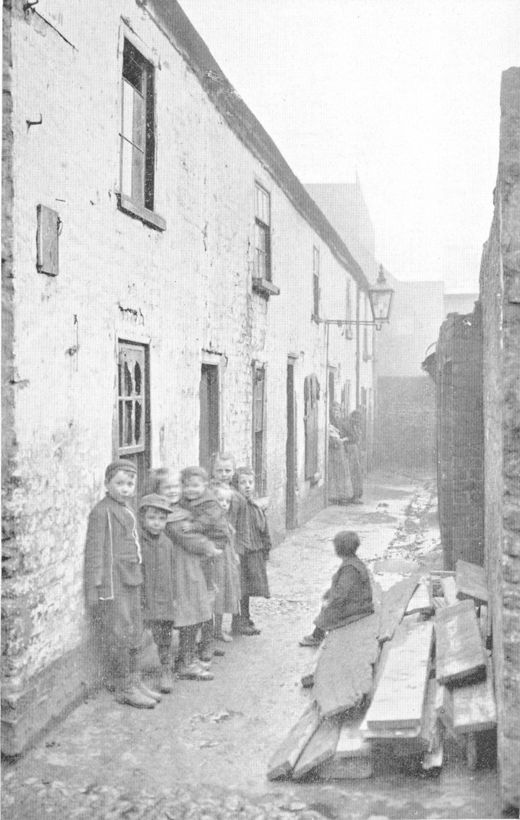 a narrow alley between buildings