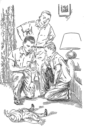 Frank, Joe and Chet looking at a handful of diamonds with puppet on the floor