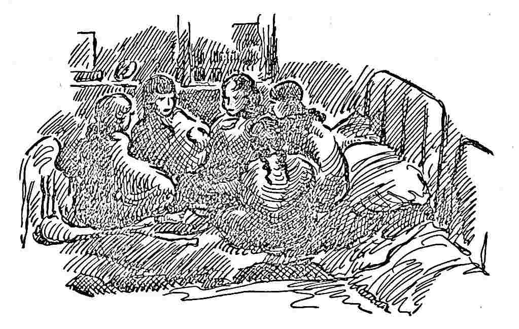 Girls huddled on a bed at night