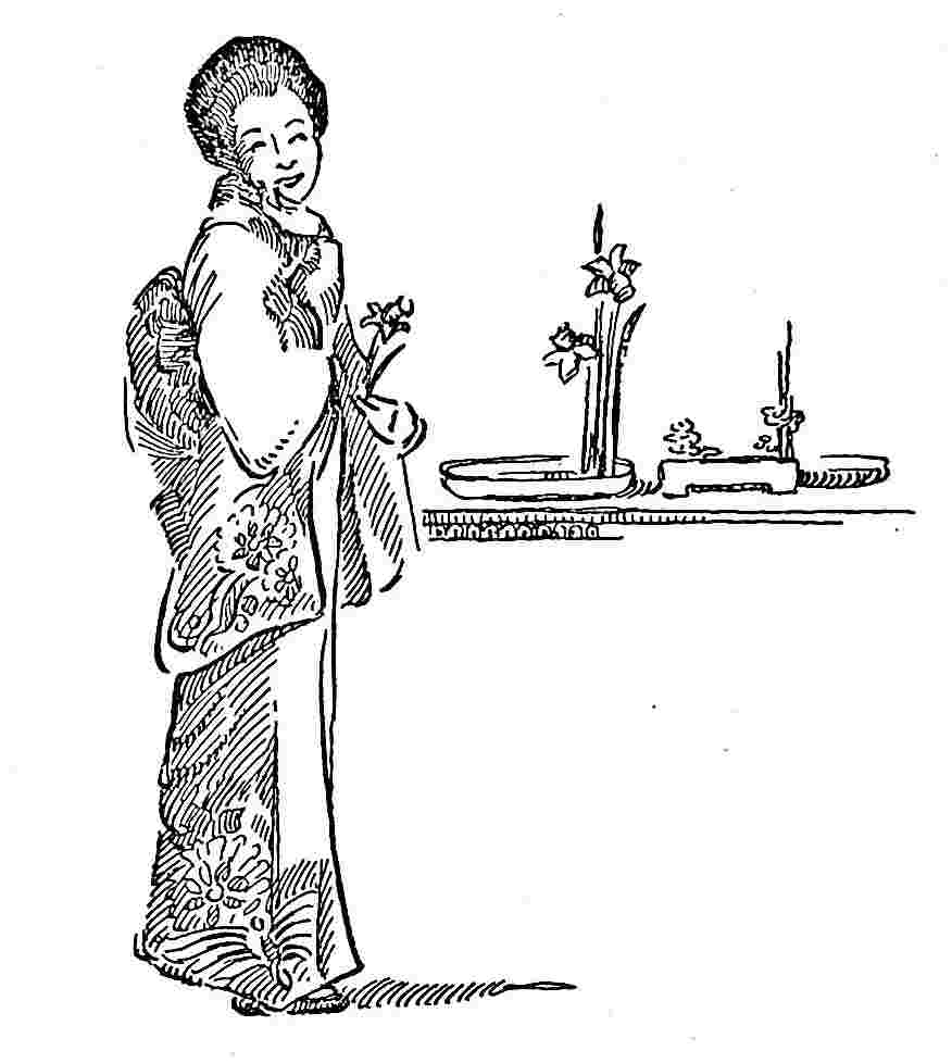 Woman standing beside a table