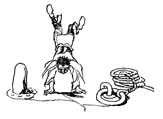 Young boy dong a handstand