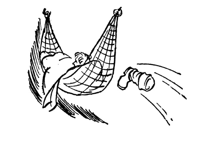 Young boy oversleeping in hammock