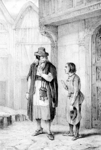 Garçon parlant à un vieil homme barbu portant un chapeau.