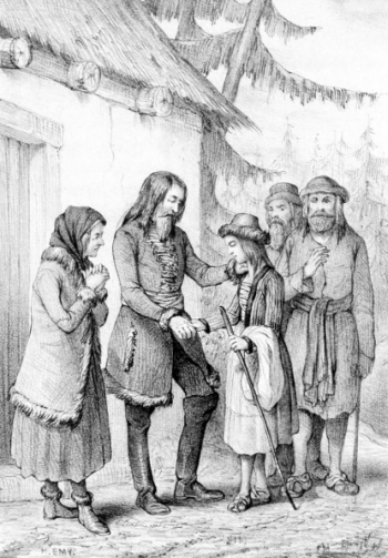 Une fille tient la main d’un homme tandis qu’une femme debout à côté de lui a les deux mains jointes.