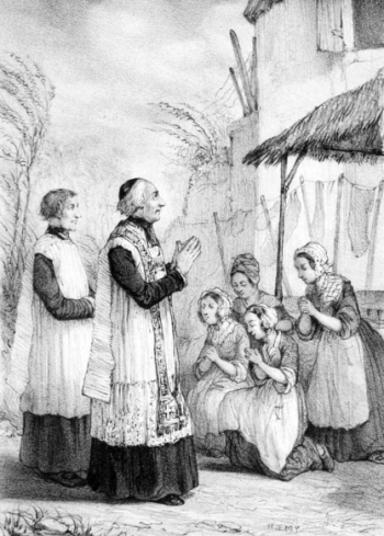 Quatre femmes priant devant un prêtre