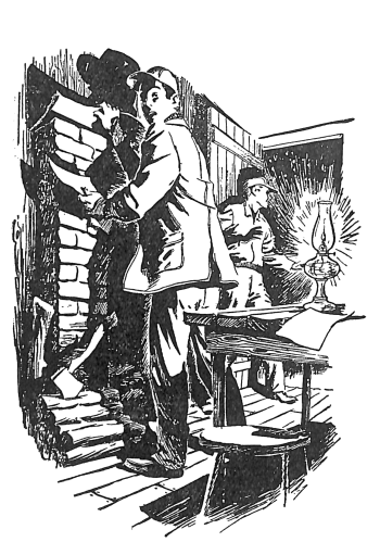 Frank putting a piece of paper between books on a wall in a cabin as he looks behind him