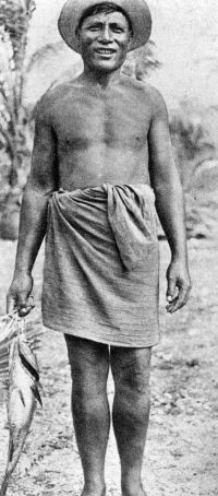 man wearing a hat and waistcloth carrying a fish