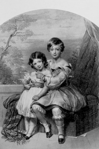two small girls posing for portrait, older seated and younger standing