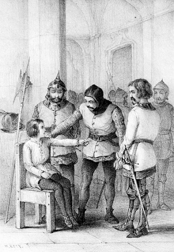 Boy seated in a chair with three soldiers surrounding him, one with arm on his shoulder