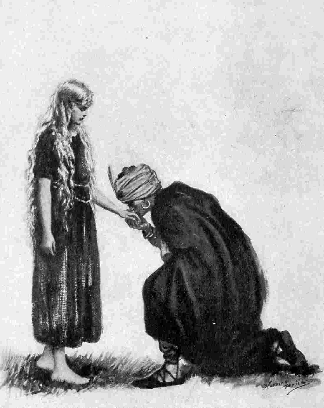 Man kneels and kisses hand of girl