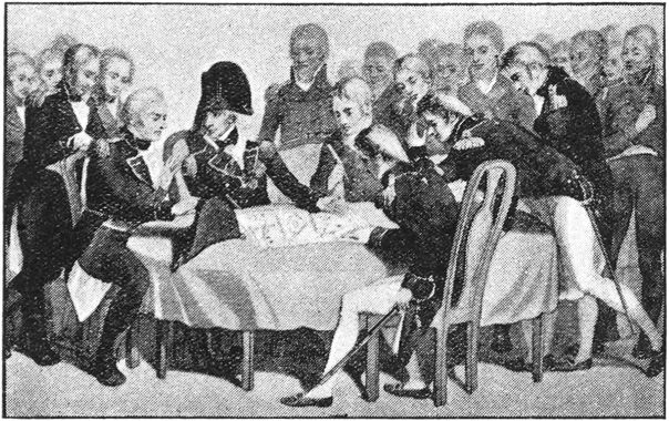 men at a table, concentrating on a map