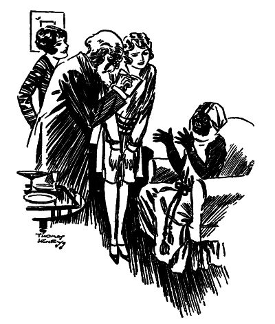 William dressed as Arab seated in a living room talking to 2 young women a bearded old man