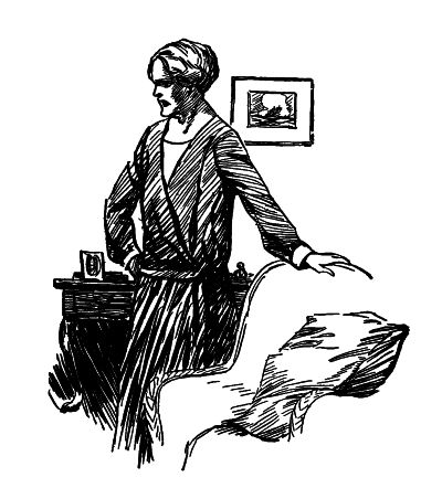 Mrs Brown with arms on hip leaning on a chair with a face of disbelief