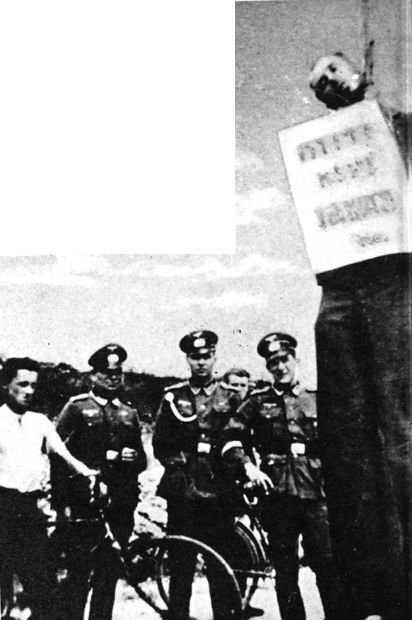 photo of hung man before German officers