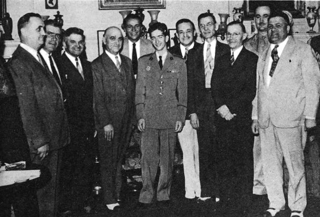 several gentlemen posing for a group photo