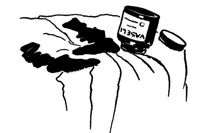 vaseline jar upturned on a bed with socks