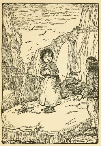 Indian boy talking to girl standing in front of a fire on a ledge in canyon