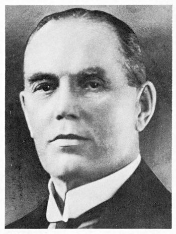 portrait face of stern man in tuxedo collar