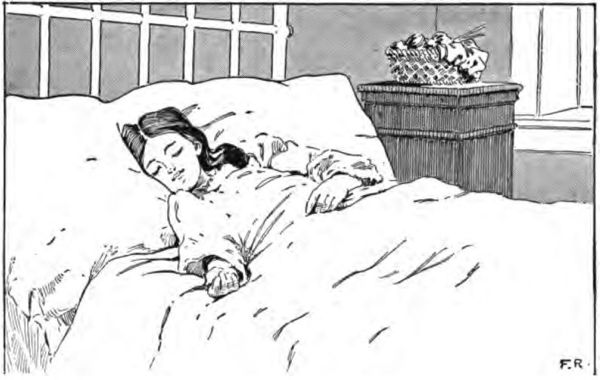 a girl asleep in bed