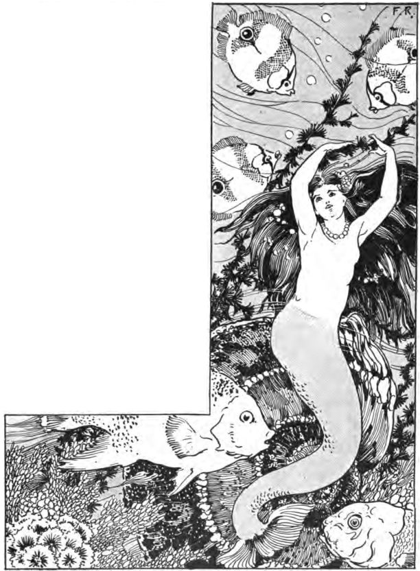 a mermaid swimming with fish