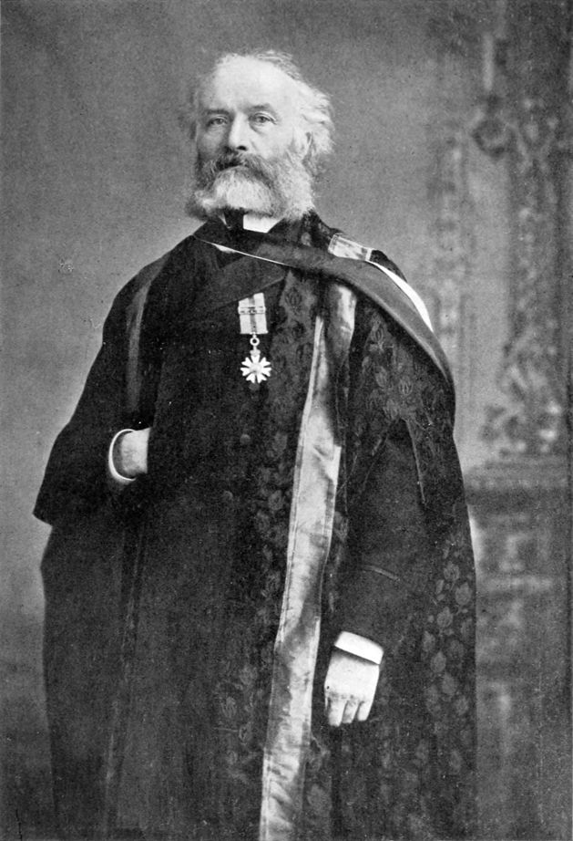 an older man in academic regalia