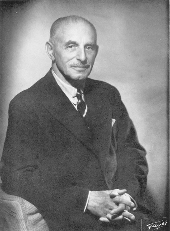 Photo of man looking into the camera.