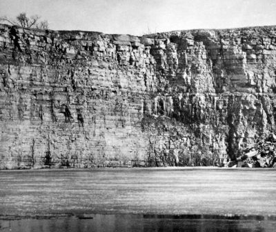 quarry wall of layered Ottawa limestone with joints