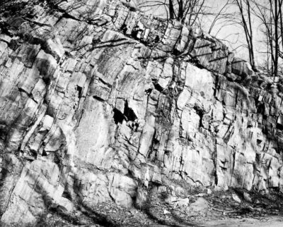 limestone layers at a diagonal on a hill