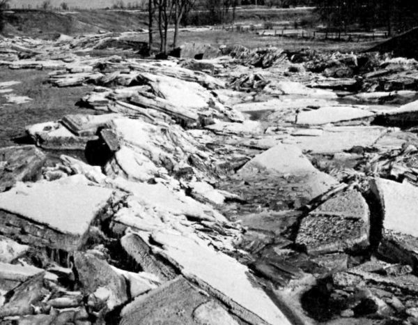 slabs of ice spilling over a hill