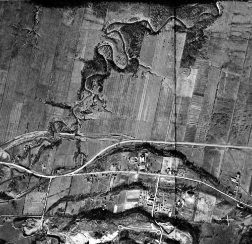 aerial view of wiggly creek, farmland and highways and quarry