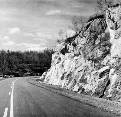 white marble hillside along parkway