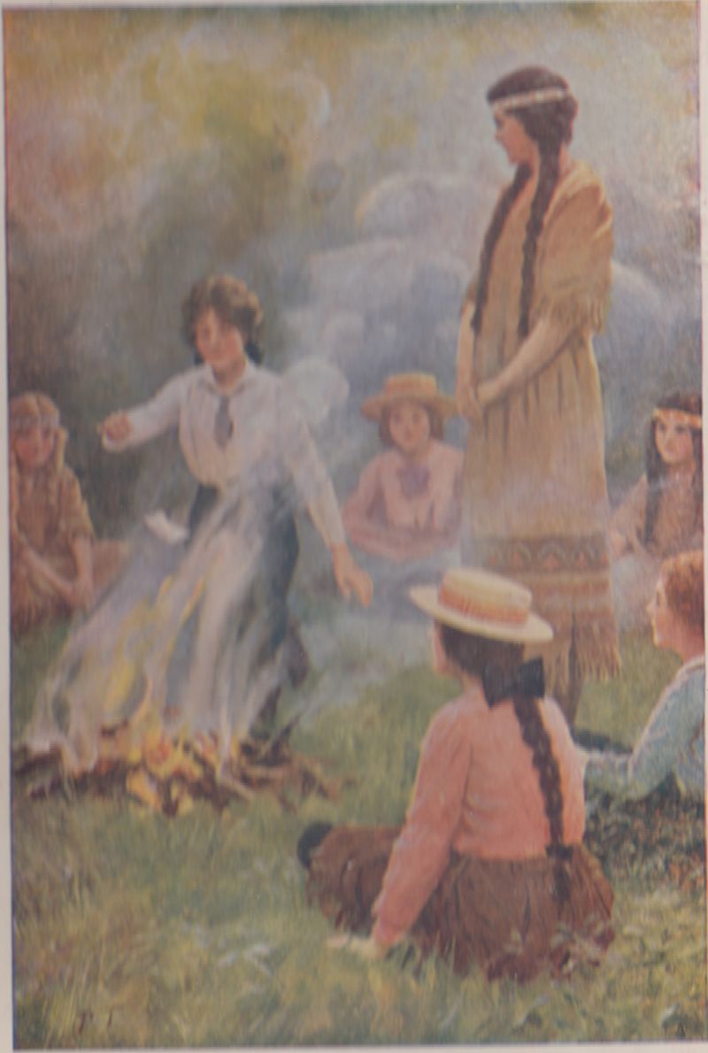Girls around a campfire