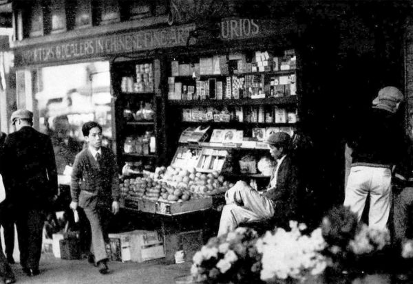 street front curio shop and vegetable vendor