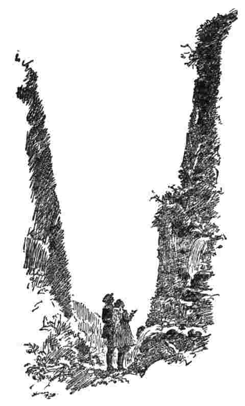 Man and woman at bottom of cliff