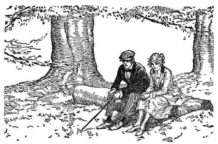 Man and woman sit beside tree